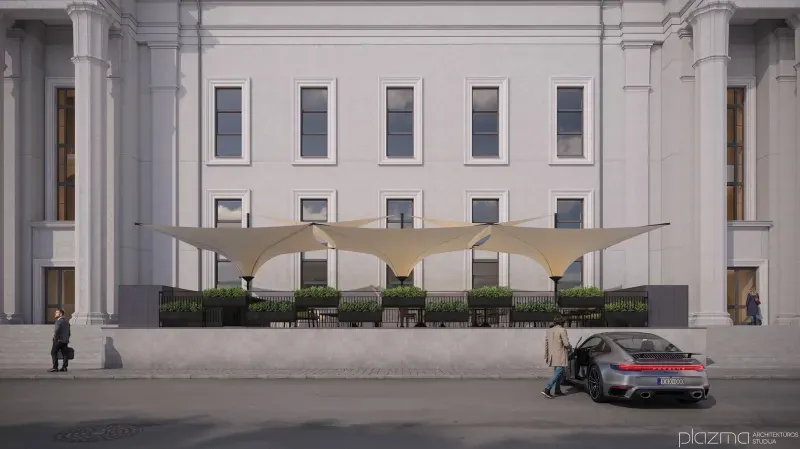 Columned façade with a terrace under three fabric canopies.