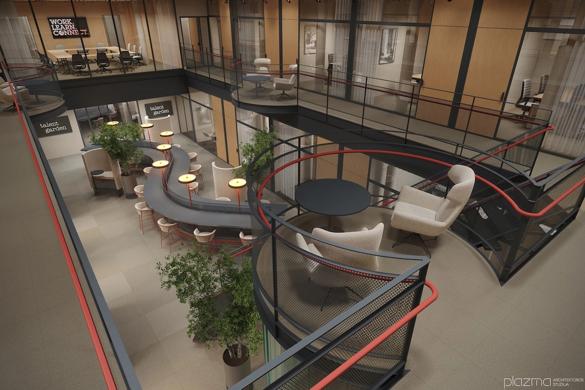 Lounge with a curved sofa and armchairs beside the atrium void.